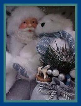 Photo of Santa Claus doll by N.L. Hopkins. Santa Claus with bear.